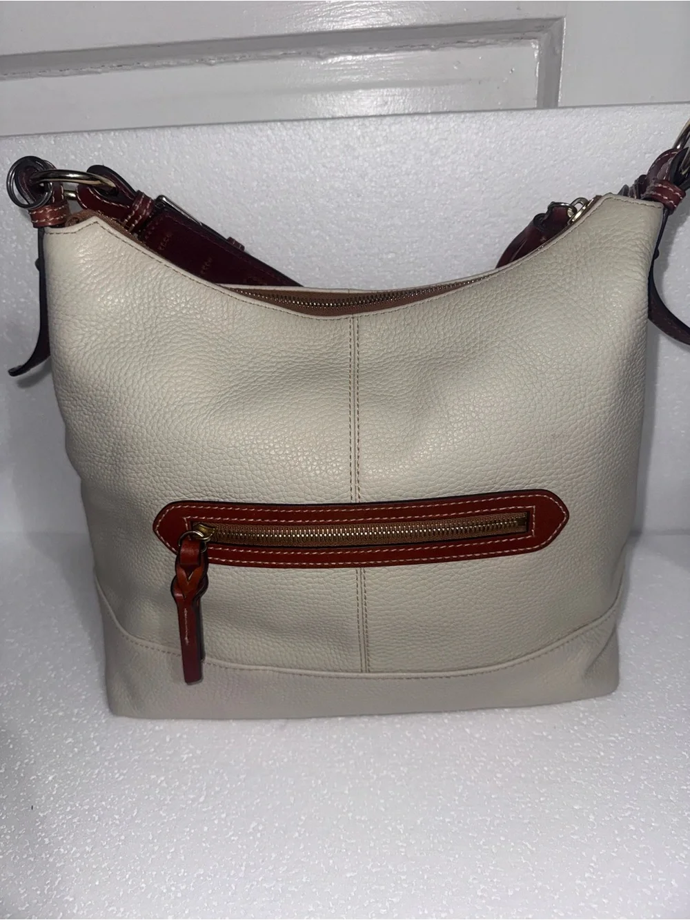 Dooney & Bourke Cream Leather Hobo with Brown Trim and Tassel